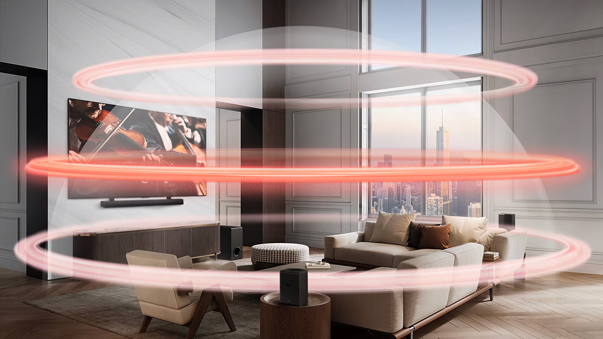 Τα LG Soundbar και LG TV σε ένα μεγάλο διαμέρισμα. Τρεις κόκκινες ταινίες, που απεικονίζουν εικονικά επίπεδα με ένα έντονο μεσαίο επίπεδο, δημιουργούν έναν ηχητικό θόλο που αγκαλιάζει τους καναπέδες.